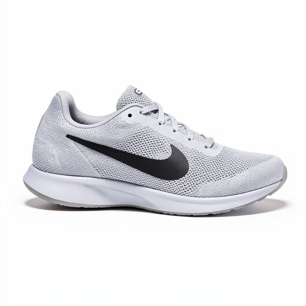 A men's running shoe in light gray mesh with a black Swoosh and a minimalist barefoot-style sole