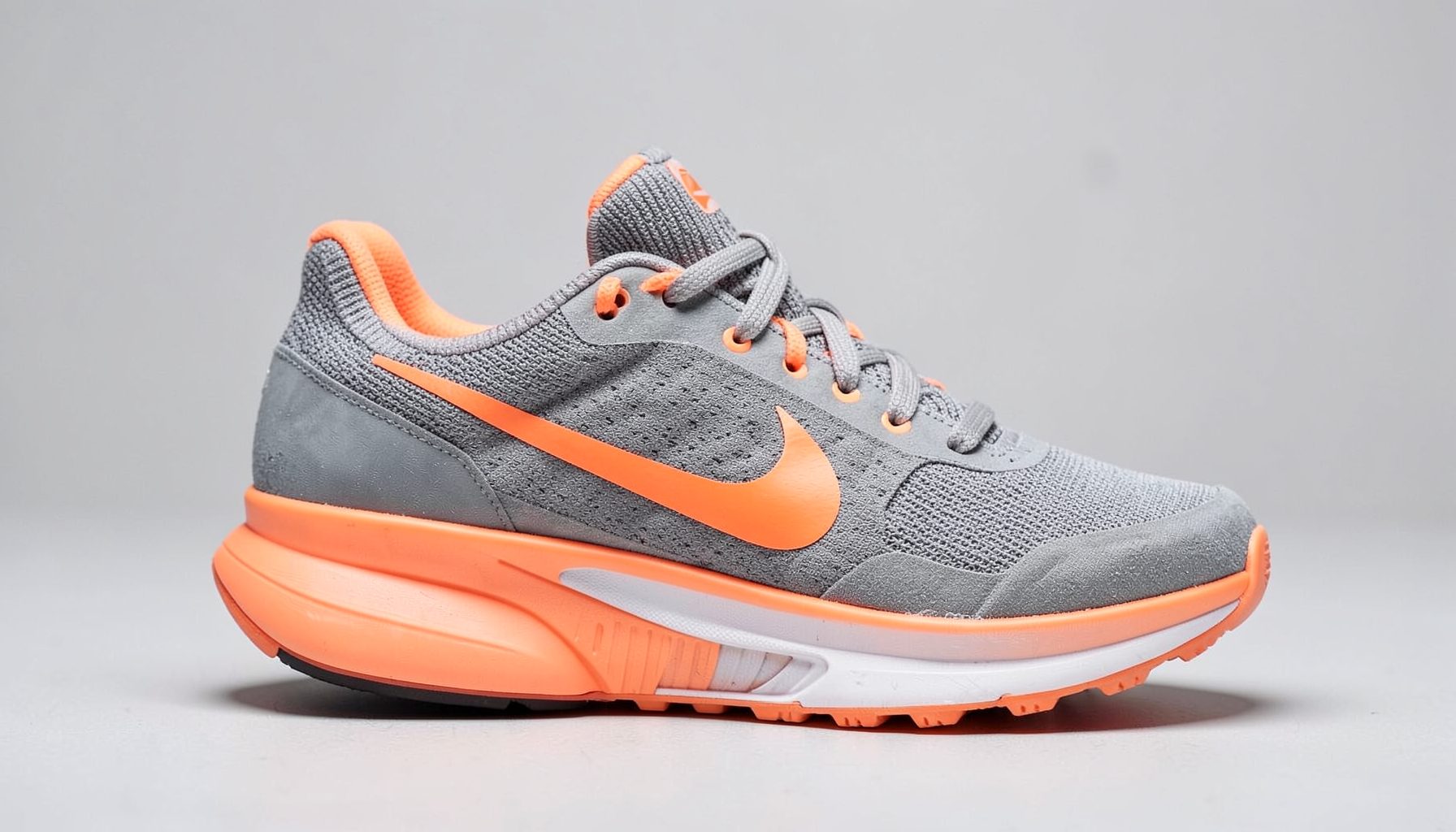 Nike Free Run 2 sneaker in gray and orange, athletic lifestyle look