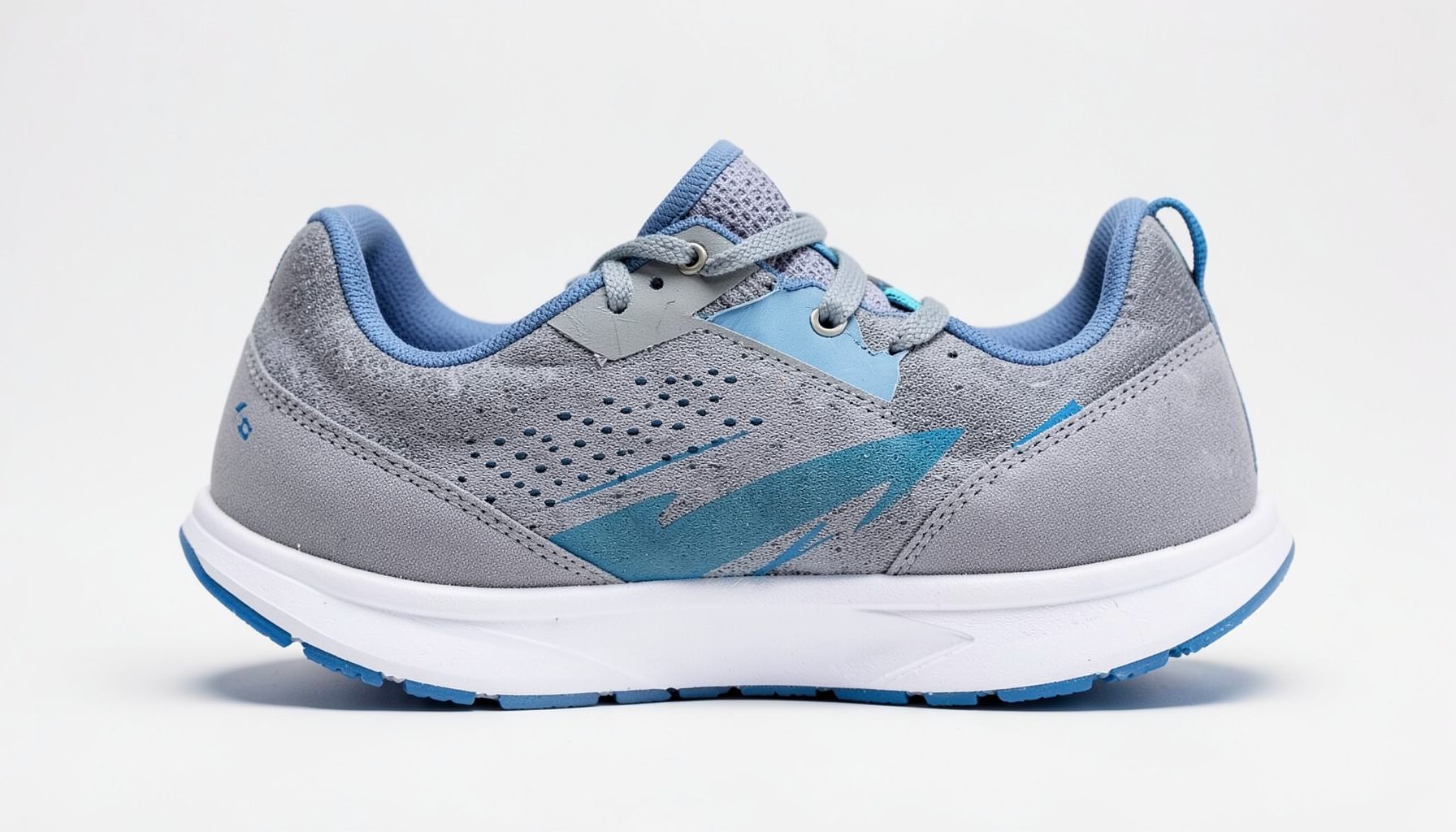 Women's running shoe in cool gray with blue accents and a white sole