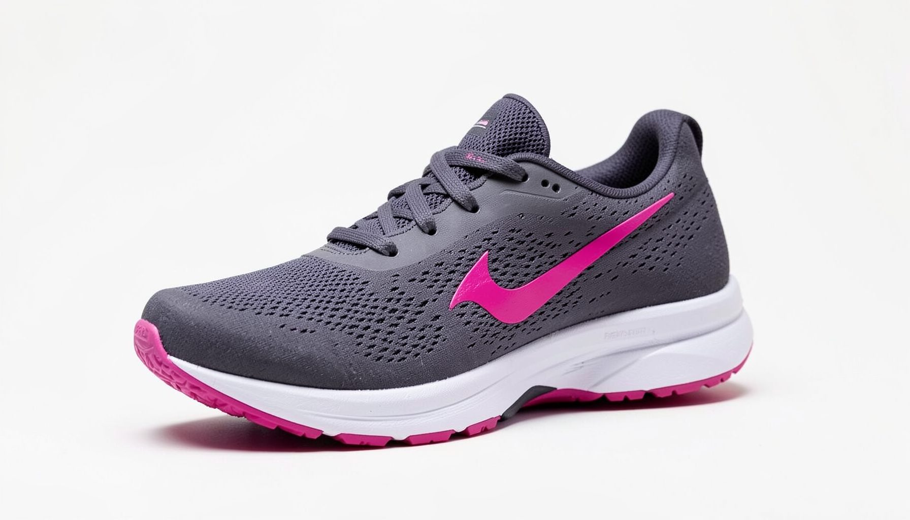 Women's running shoe in deep gray with fuchsia swoosh detailing